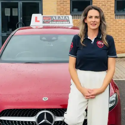 Alma Driving School instructor with a dual controlled car at Doncaster Driving Test Centre